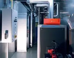 Quels sont les composants du système de contrôle de la température de la machine à briques?